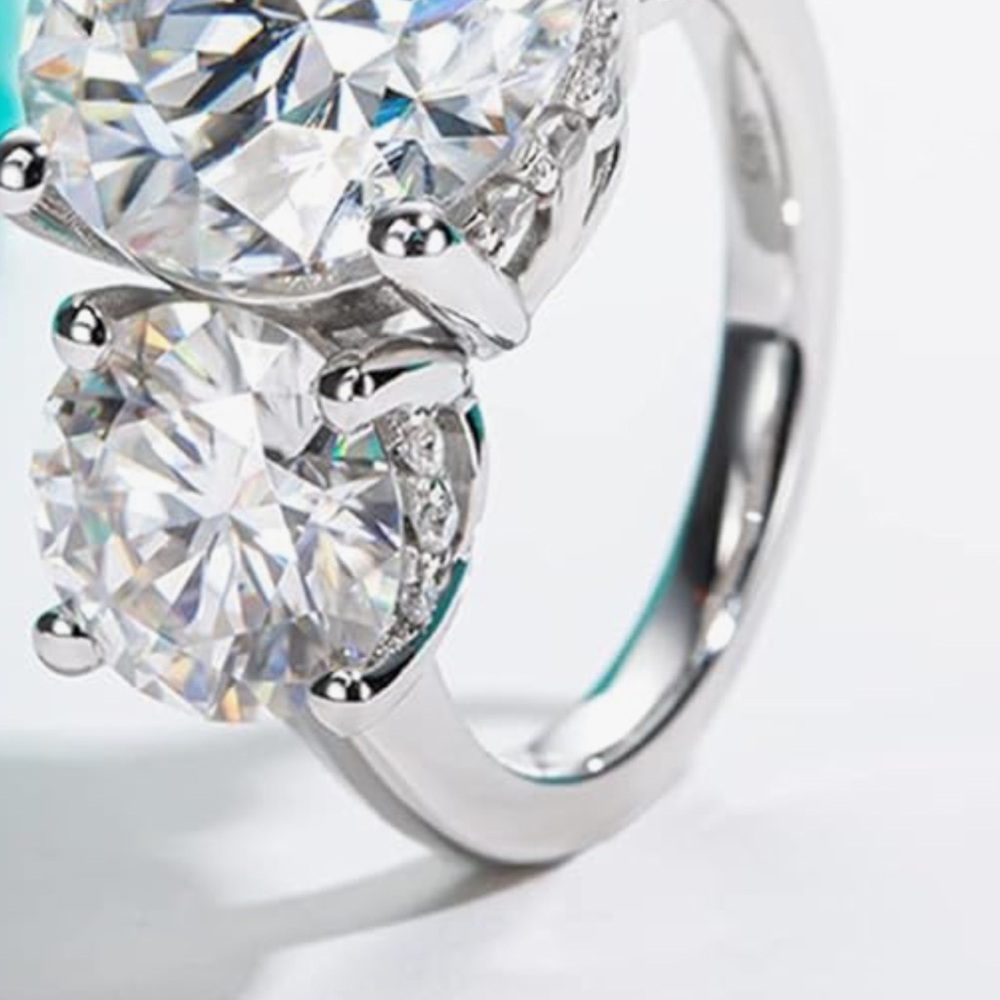 A Moissanite incredibly beautiful ring. Pictures do not do justice.